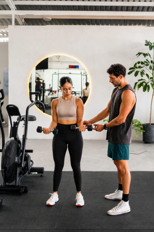 A Trainer Pro coach reviewing a personalized plan with a client
