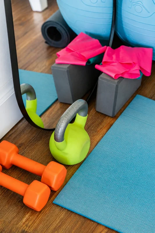 Personal trainer coaching a squat in North York