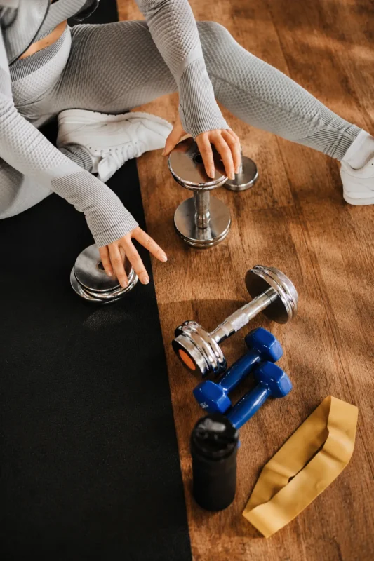 In-home personal trainer coaching a squat in a Vaughan private gym